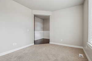 View of carpeted spare room