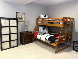 Bedroom with light colored carpet