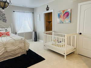 Bedroom featuring carpet