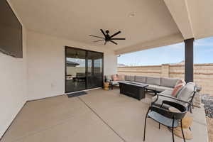 View of patio / terrace featuring outdoor lounge area and ceiling fan