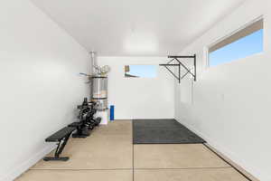 Garage featuring secured water heater