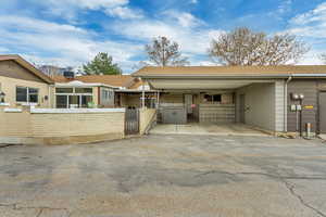 View of front of house featuring a carport