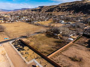 Birds eye view of property with a mountain view