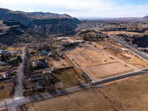 Birds eye view of property with a mountain view