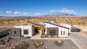 Back of house featuring a mountain view