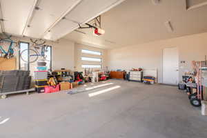 Garage featuring a garage door opener