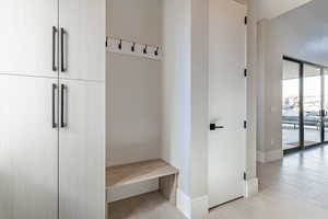 Mudroom featuring light wood-type flooring