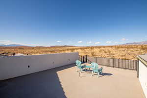 View of patio with a mountain view