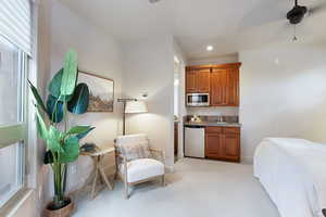 Sitting room with light colored carpet