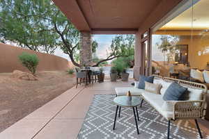 View of patio featuring an outdoor hangout area