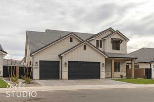 View of front of house with a garage