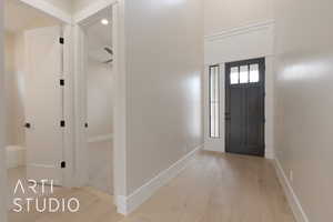 Foyer featuring light hardwood / wood-style flooring