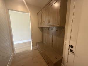 Mudroom with light wood-type flooring