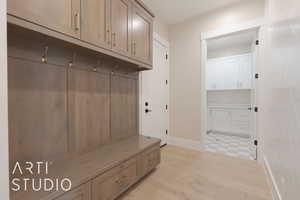 Mudroom with accent wall