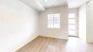 Unfurnished room featuring light hardwood / wood-style flooring