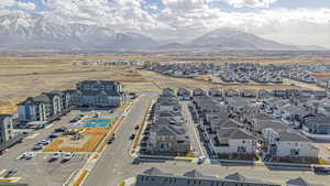 Birds eye view of property with a mountain view