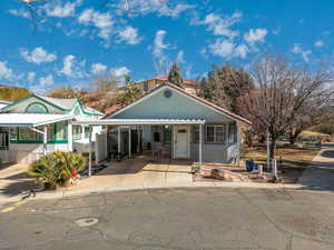 View of front of home with a carport