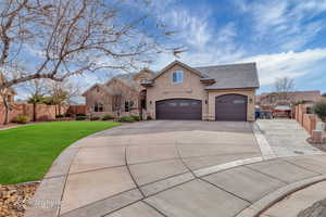 View of front of house with a front yard