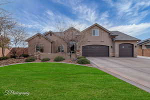 View of front of home featuring a front lawn