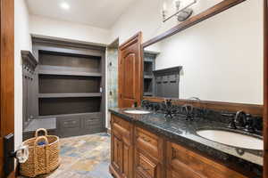Bathroom featuring vanity and built in features