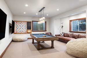 Playroom featuring carpet floors and pool table