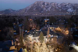 Aerial view at dusk featuring a mountain view