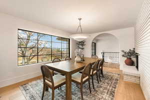 Dining space with light wood-type flooring