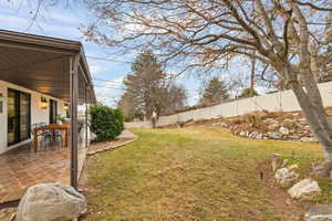 View of yard featuring a patio