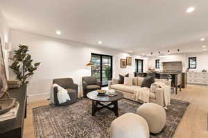 Living room with light wood-type flooring