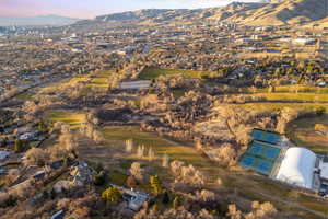 Aerial view at dusk featuring a mountain view