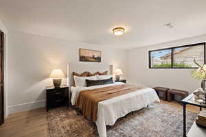 Bedroom featuring hardwood / wood-style floors