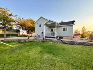 Summer View of retaining wall landscaping and beautiful green lawn