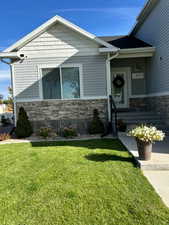 Summer view of Front entrance to home