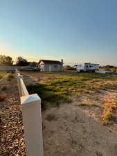 Summer View of extra parking space next to 2 car garage