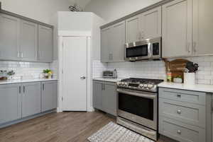 Plenty of cupboard space and walk in pantry