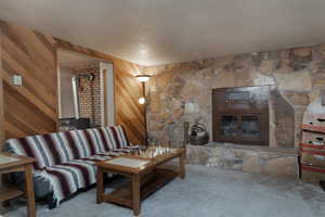 Family Room in Basement including Wood Burning Fireplace