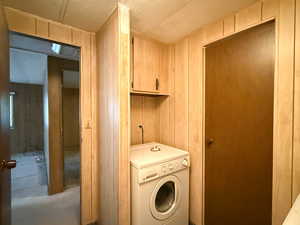 Laundry room featuring washer / clothes dryer