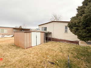 Exterior space with a shed