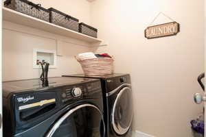 Clothes washing area with washer and dryer