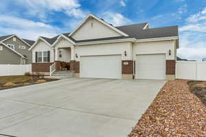 View of front facade with a garage