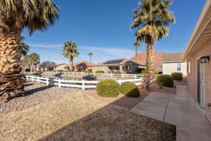 View of yard with a mountain view and a patio area