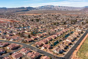 Birds eye view of property featuring a mountain view