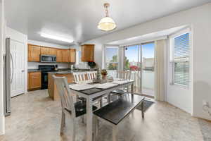 Dining space featuring sink