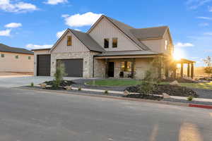 Modern inspired farmhouse with a garage