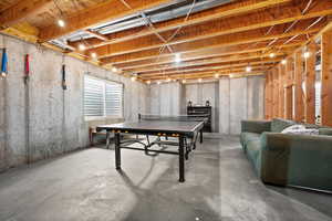 Game room with concrete floors