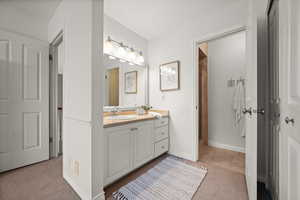 Bathroom featuring vanity and tile patterned flooring