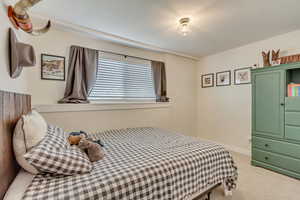 View of carpeted bedroom