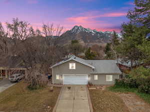 Ranch-style house featuring a mountain view