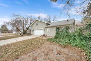 View of home's exterior featuring a garage