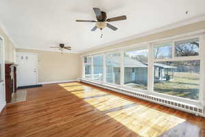 Living Room featuring hardwood floors and dramatic "wall of windows".